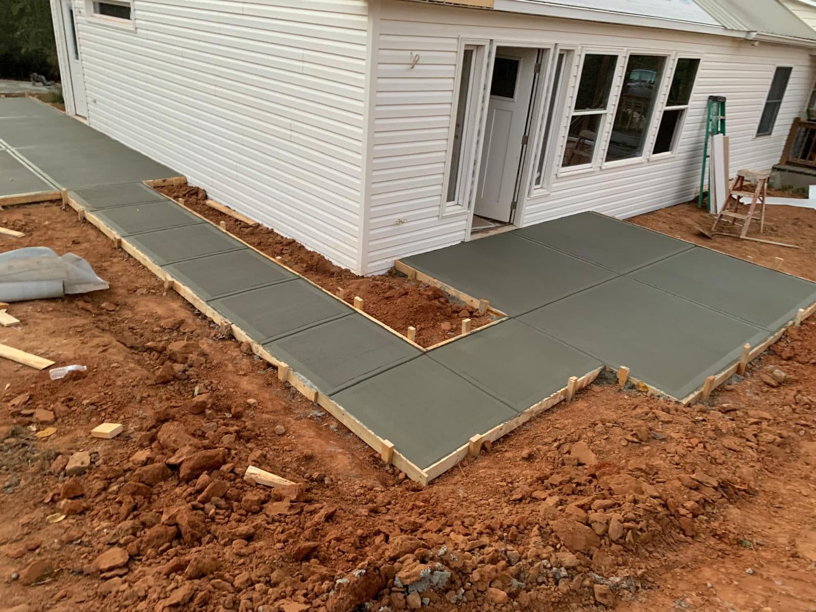 Concrete patio and side walk connection